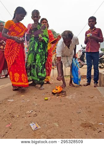 Tiruvanamalai, India - 16 december 2019: People doing puja on Vishnu day in the streets from Tiruvanamalai India