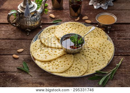 Moroccan Pancakes Baghrir Served With Almond Paste, Honey And Mint Tea