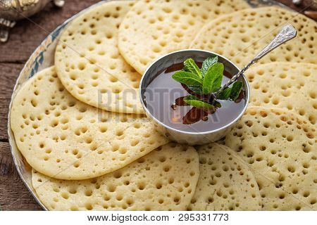 Close View Of Morrocan Pancakes Baghrir With Honey