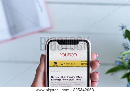 Kharkiv, Ukraine - April 10, 2019: Woman Holds Apple Iphone X With Politico.com Site On The Screen.