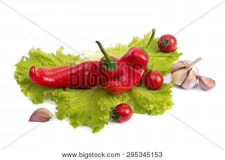 Red Sweet Pepper With Tomatoes And Garlic. Red Sweet Long Peppers On A White Background. Tomatoes An