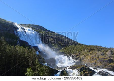 View On Langfossen Langfoss Waterfall In Summer, Etne, Norway