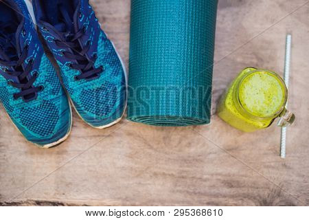 Everything For Sports Turquoise, Blue Shades On A Wooden Background And Spinach Smoothies. Yoga Mat,