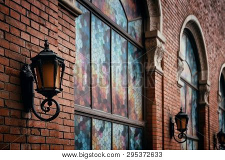 Road lamp and wall window patterns in Xiahao Old street in Chongqing, China.