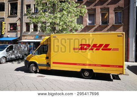 Nuremberg, Germany - May 7, 2018: Dhl Courier Delivery Van In Germany. Dhl Is Part Of German Nationa