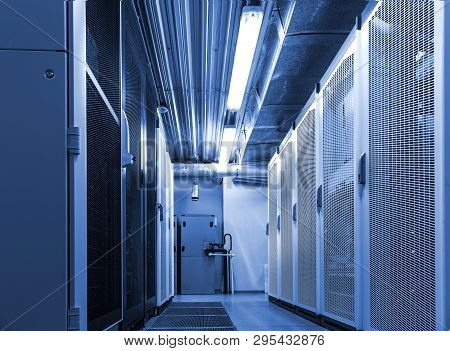 Corridor In Datacenter Server Room For Exchanging Cyber Data, Cloud Computing And Connection