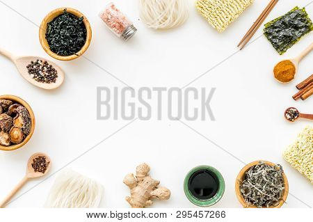 Rice Vermicelli, Noodles, Spices, Weeds Frame To Cook Chinese And Japanese Food On White Background 