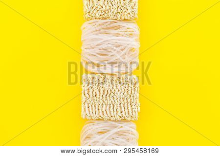 Chinese And Japanese Food Cooking With Rice Vermicelli, Noodles On Yellow Background Top View Mockup
