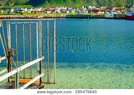 Fishing Port Old Pier And Gate With Bleik Village Houses In The Background. Andoya Island, Vesterale