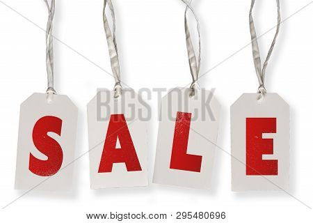 Hanging Cardboard Tags With Word Sale Against White Background