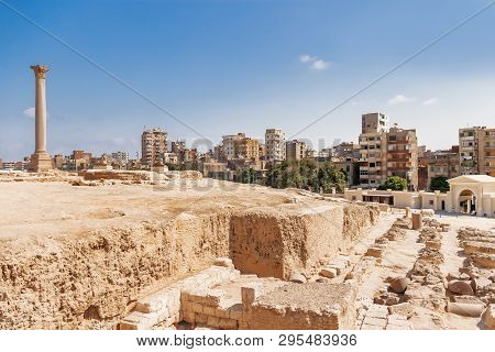 Pompeys Pillar, Roman Triumphal Column, With Two Sphinx Statues Located At The Serapeum Of Alexandri