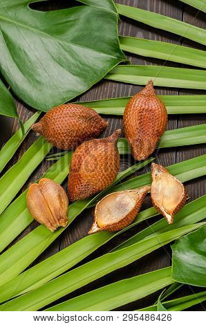 Snake Fruit, Rakum, Sala On Wood Background. Tropical Fruit.