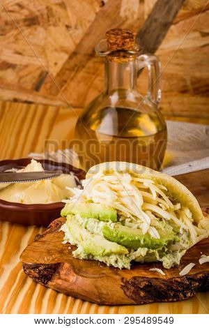 Typical Latin American Food, Arepa For Breakfast With Cheese, Avocado And Chicken