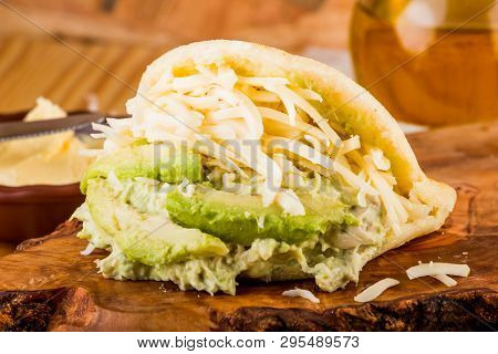 Typical Latin American Food, Arepa For Breakfast With Cheese, Avocado And Chicken