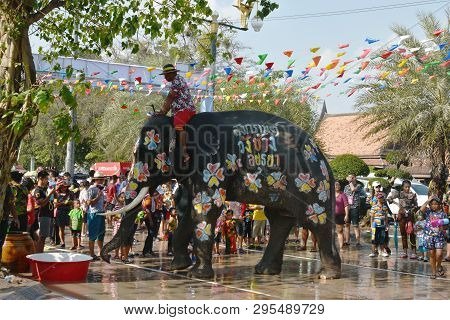 Ayutthaya Thailand April 14, 2019 : Elephant Splashing Water Between Tourist In Songkarn Festival