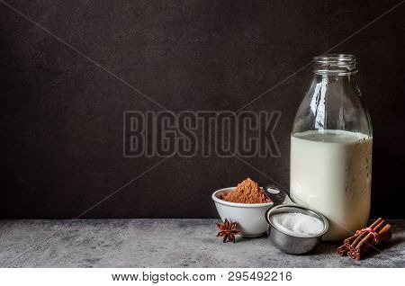 Hot Chocolate Ingredients Near A Blackboard To Whrite The Recipe On, Copy Space For Your Text