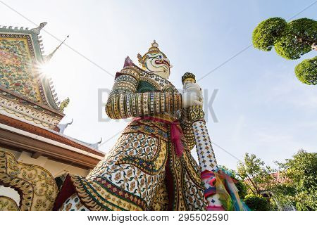 Statue Of The Mythical Guard At The Entrance Of Ordination Hall At Wat Arun In Bangkok, Thailand