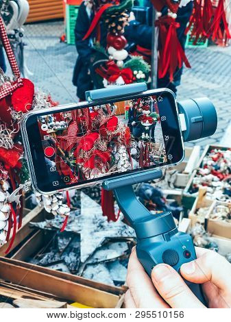 Germany, Nuremberg - December 17, 2018: Close-up Of Man Blogger Hands Shooting Video On Smartphone I