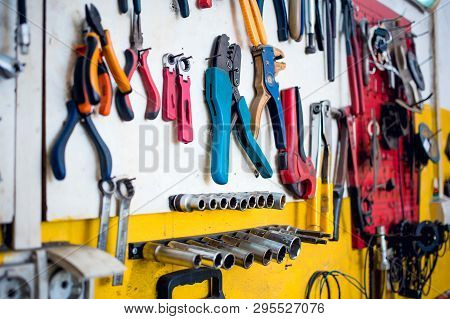 Close-up Photo Of Pliers Tools Inside The Car Mechanic Shop. Set Of Tools. Car Repair Equipment.