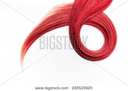 Piece Of Beautiful, Shiny, Red Hair On White Isolated Background. Circular, Loop Shape.   Modern Hai