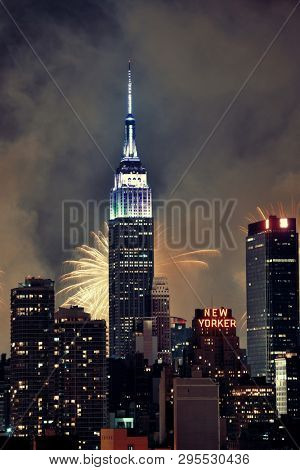 NEW YORK CITY - JUL 4: Empire State Building with fireworks on July 4, 2015 in Manhattan, New York City. With population of 8.4M, it is the most populous city in the United States.