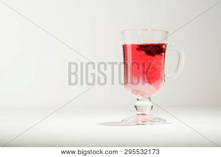 Transparent Glass Cup With Hot Red Tea From Hibiscus Or Hibiscus.