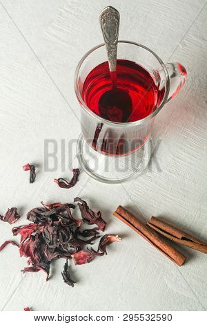 Transparent Glass Cup With Hot Red Tea From Hibiscus Or Hibiscus.