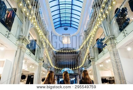 Athens, Greece - 26 Mar 2016: Low Anlge View Of Majestic Illumination Inside The Passage Of H And M 