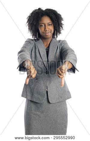 Black African American Female Businesswoman Isolated On A White Background Gesturing Thumbs Down