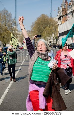 London, United Kingdom, 15th April 2019:- Extinction Rebellion Protesters Block And March Down White