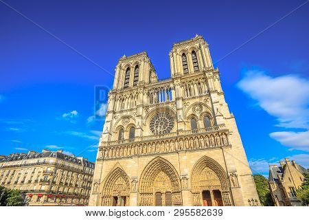 Details Of French Architecture Of Notre Dame Cathedral Of Paris, France. Beautiful Sunny Day In The 