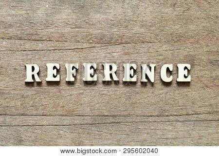 Letter Block In Word Reference On Wood Background