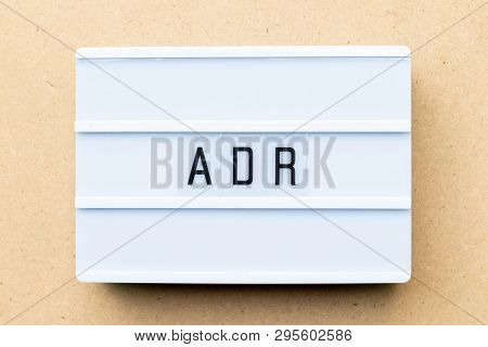White Lightbox With Word Adr (abbreviation Of Adverse Drug Reaction) On Wood Background