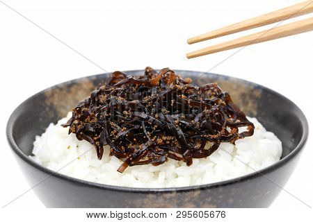 Japanese Tsukudani Of Konbu With Cooked White Rice On White Background