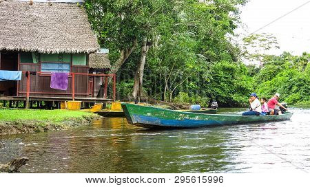 Madidi River, Bolivia - May 5: Instant Of A Boat With People Sailing In The River, On May 5, 2015 In