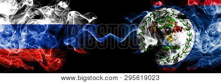 Russian Vs Belize, Belizean Smoke Flags Placed Side By Side. Thick Colored Silky Smoke Flags Of Russ