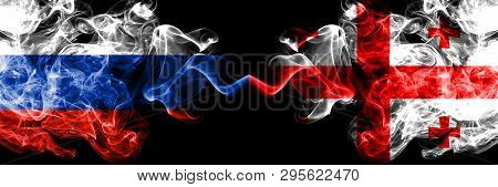 Russian Vs Georgia, Georgian Smoke Flags Placed Side By Side. Thick Colored Silky Smoke Flags Of Rus