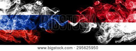 Russian Vs Monaco, Monacan Smoke Flags Placed Side By Side. Thick Colored Silky Smoke Flags Of Russi
