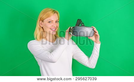 Beautiful Woman Wearing Virtual Reality Goggles In Studio. Person With Virtual Reality Helmet Isolat