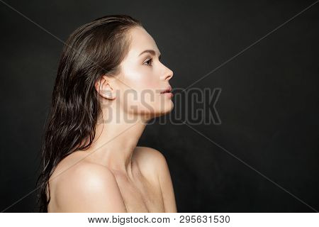 Beautiful Healthy Womal With Clear Skin On Black Background. Skincare And Facial Treatment
