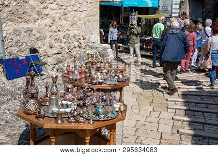 Mostar, Bosnia And Herzegovina - April, 2019: Mostar Old Town. Tourists And Souvernirs At The Market