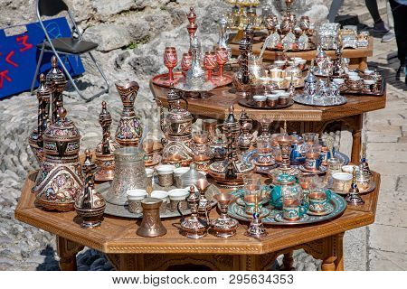 Mostar, Bosnia And Herzegovina - April, 2019: Mostar Old Town. Tables With Decorative Souvernirs At 