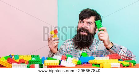 It Is Correct. Smiling Dad Playing Kit. Cheerful Father Play Game. Dream About Leaisure. Building Wi