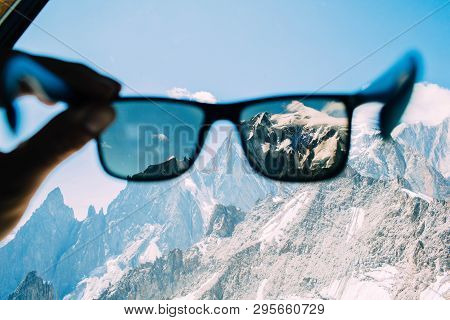 Shot Of Snowy Mountain Peak-mont Blanc Massif, Through Sunglasses. Punta Helbronner