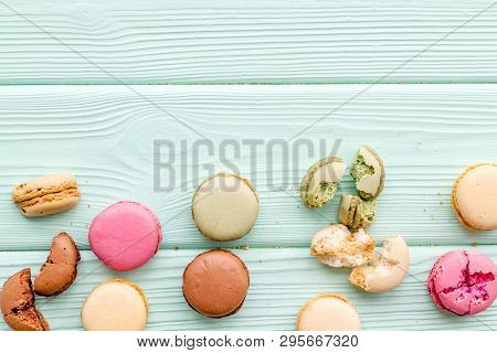 Brignt Macarons For Sweet Break On Mint Green Background Top View Mock Up