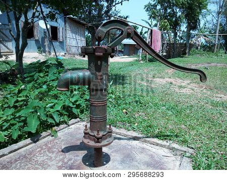 hand pump in the village in a unused condition