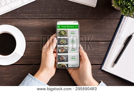 Takeaway Service. Female Hands Scrolling Smartphone Screen With Food Delivery Application, Choosing 