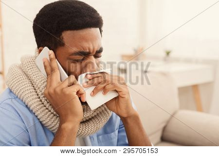 Online Consultation With Doctor. Sick Man Calling Phone For Medical Help, Suffering From Cold And Se