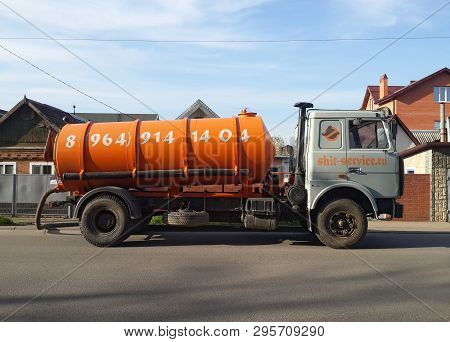 Krasnodar, Russia - April 7, 2019: Sanitation Truck Parked Aside Private Houses. Cesspool Cleaning C