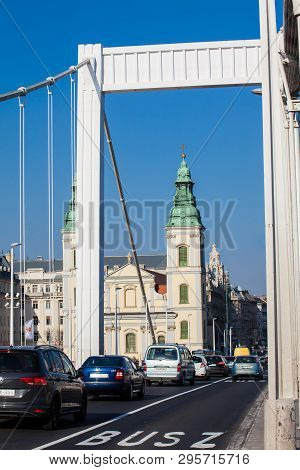 Budapest, Hungary - April, 2018: Elisabeth Bridge And The Parochial Church Of The Assumption Of The